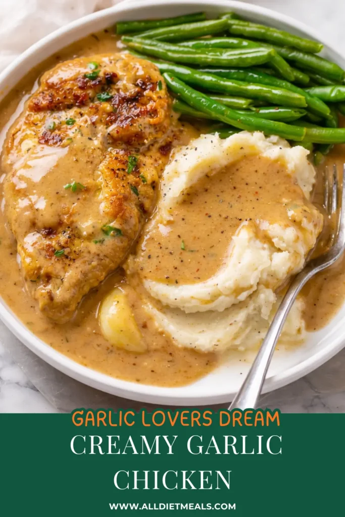 Creamy Garlic Chicken in a rich garlic Parmesan gravy, made in one skillet with whole caramelized garlic cloves